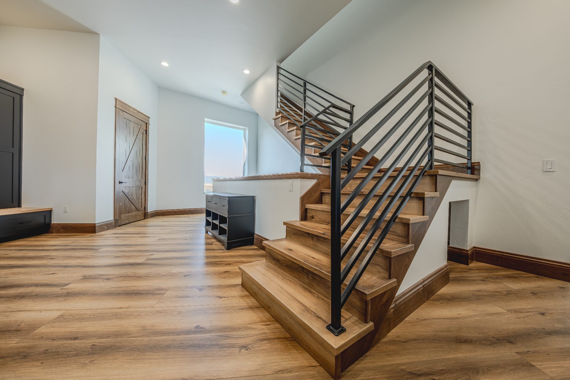 Grand staircase with hardwood treads