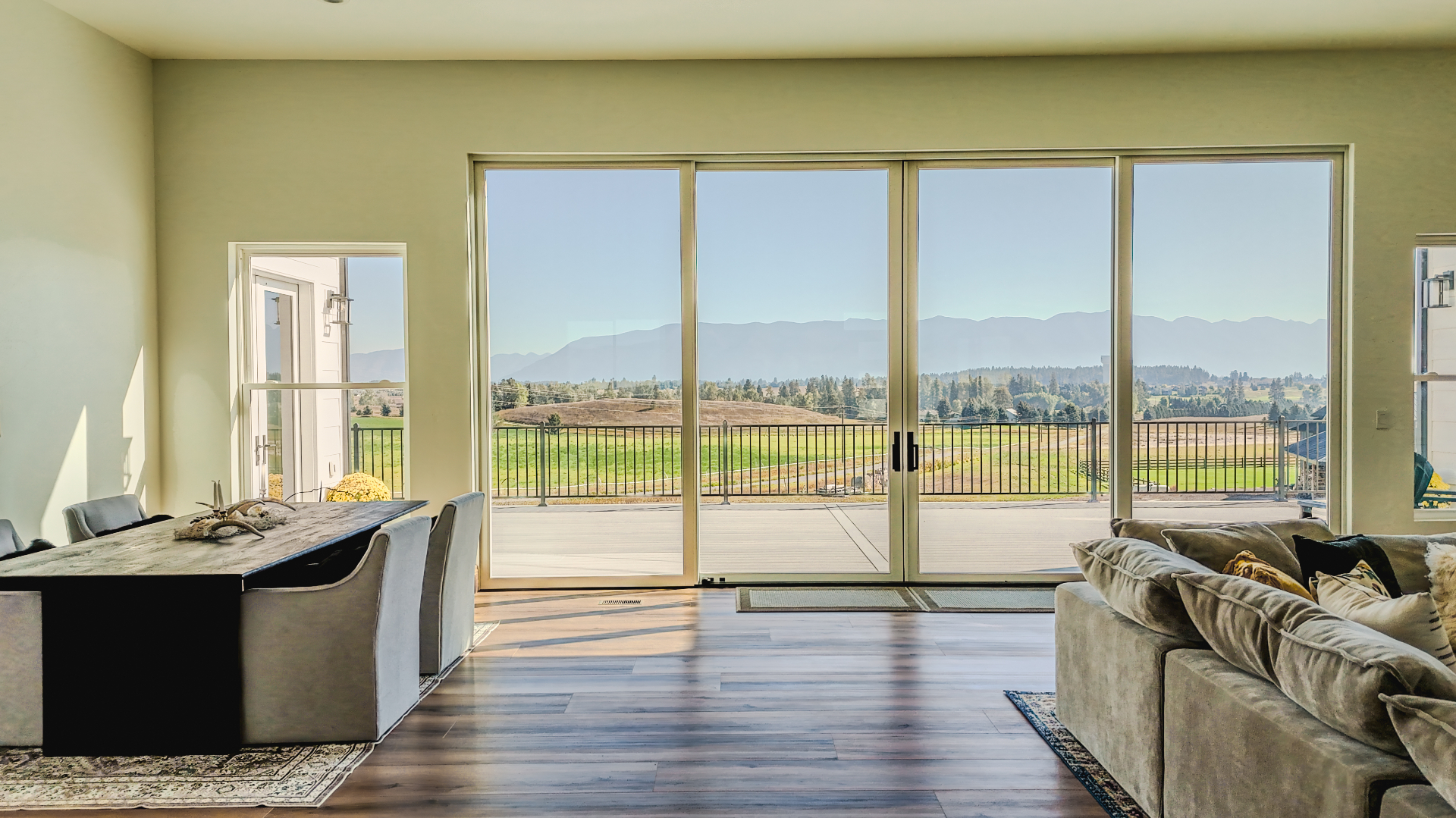 Luxury interior with mountain views and hardwood flooring